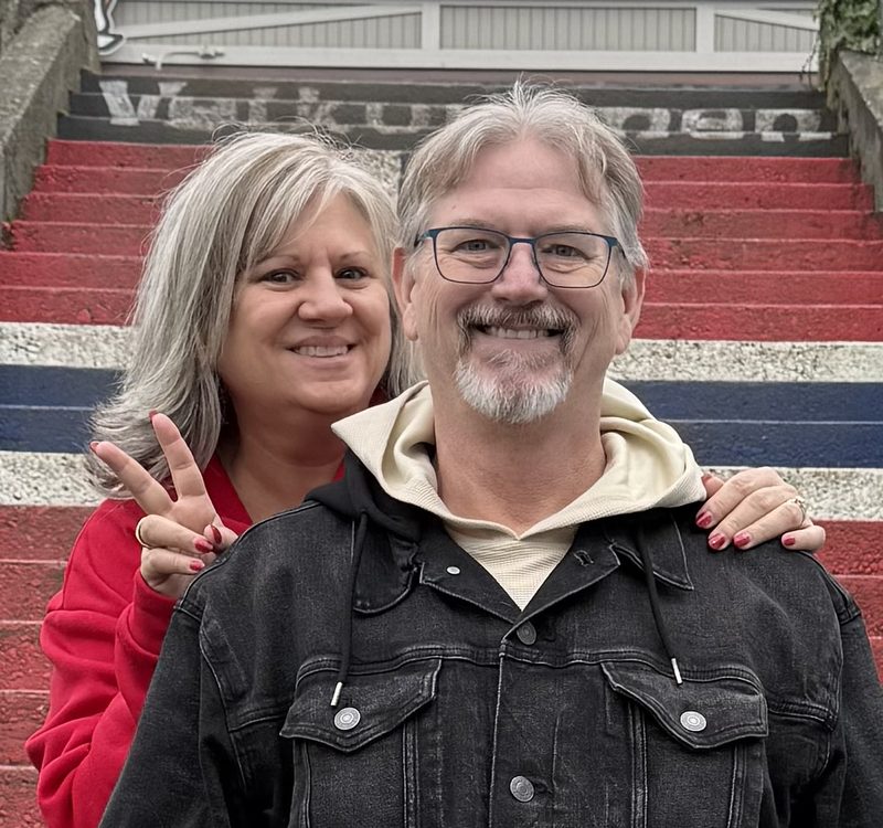 Eva and Moose on the red steps